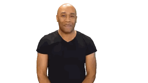 Bald Man Smiling in Black T-Shirt