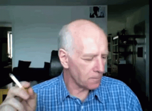 Bald Man Smoking Cigarette GIF