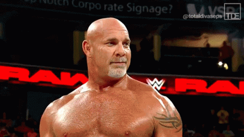 Bald Man Standing in Front of Raw Sign