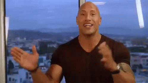 Bald Man Standing with Arms Out