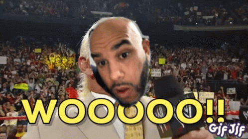 Bald Man Talking Into Microphone Woooo