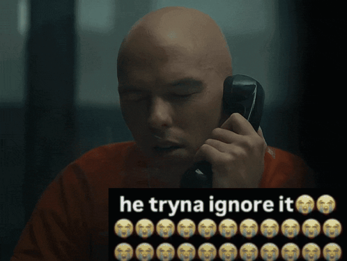 Bald Man Talking on Cell Phone He Tryna Ignore It