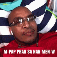 Bald Man Wearing Glasses Lying on Blanket