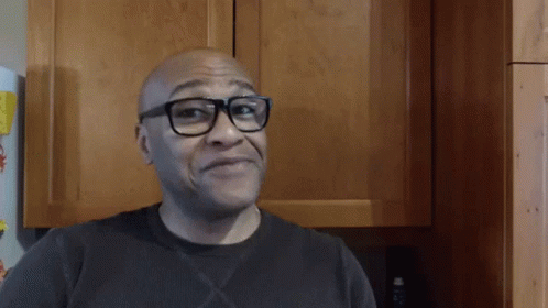 Bald Man Wearing Glasses Smiling GIF