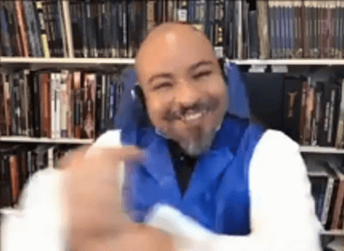 Bald Man Wearing Headphones Smiling