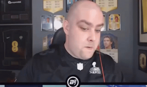 Bald Man Wearing Super Bowl XVIII Jersey