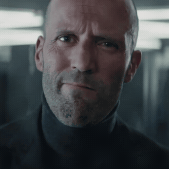 Bald Man With Beard in Black Turtleneck
