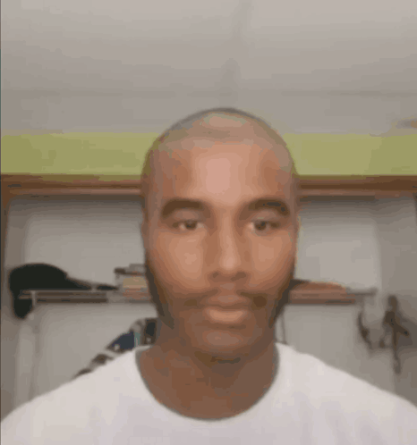 Bald Man With Beard in White Shirt