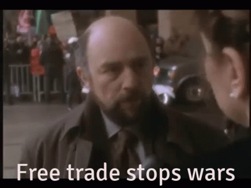 Bald Man With Beard Talking To Woman Free Trade Stops Wars GIF