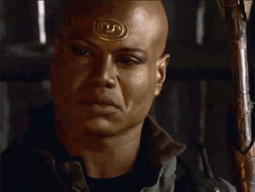 Bald Man with Circle on Forehead Says Indeed