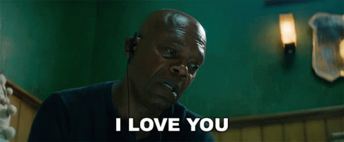 Bald Man With Earbuds Saying I Love You GIF