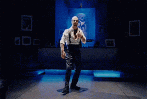 Bald Man With Glasses And Beard Blue Background GIF