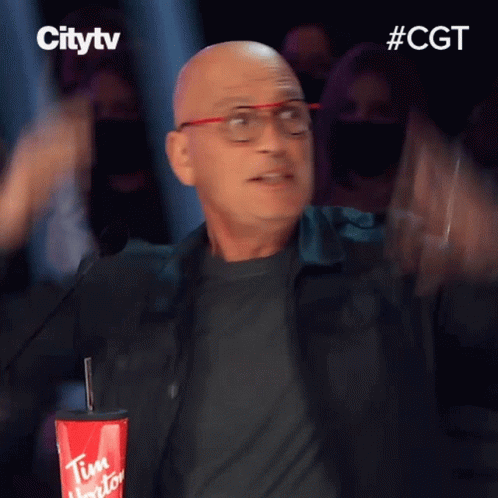 Bald Man With Glasses Holding Tim Hortons Cup GIF