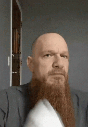 Bald Man with Long Red Beard