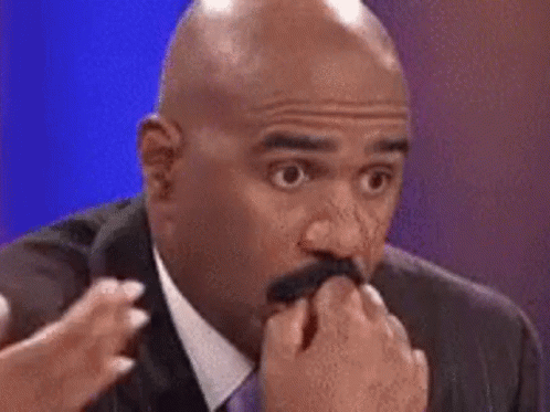 Bald Man With Mustache Covering Mouth GIF