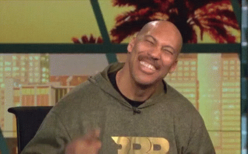 Bald Man With Mustache Laughing In Hoodie GIF