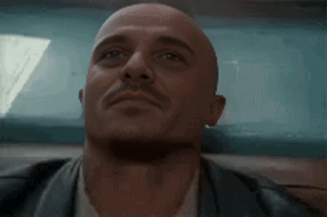 Bald Man With Mustache Looking Up GIF