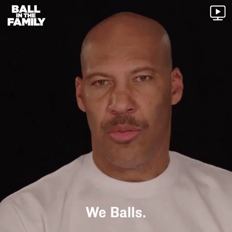 Bald Man With Mustache Talking About Balls