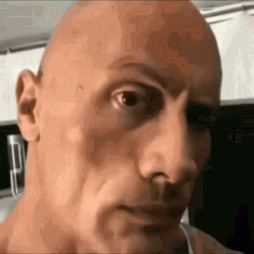 Bald Man with Serious Expression