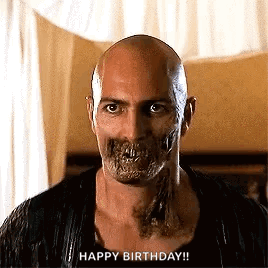 Bald Man With Skull on Face Says Happy Birthday