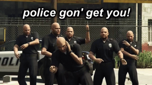 Bald Police Officers in Front of Police Car