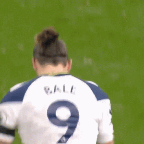 Bale Is Wearing A White Jersey With The Number 9 On It GIF