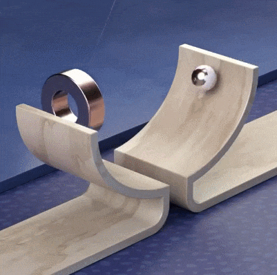 Ball Going Through Swinging Pendulum GIF