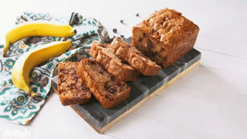 Banana Bread On Cutting Board GIF