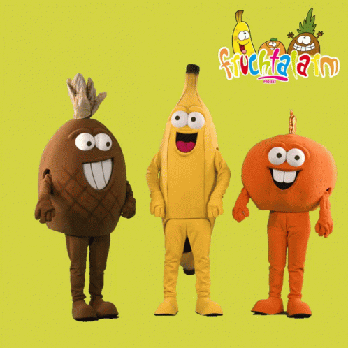 Banana Pineapple Orange Mascots in Front of Fruchtaland Sign