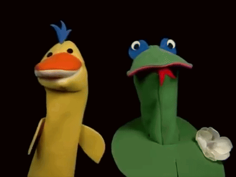 Banana Puppet and Frog Puppet Standing Together