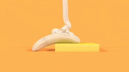 Banana Sitting On Yellow Square GIF