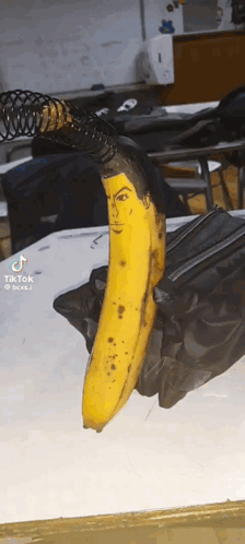 Banana with Painted Face Sitting