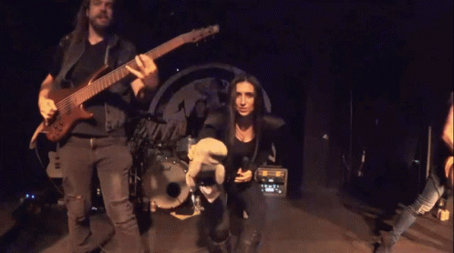 Band Singer Holding A Manatee Toy GIF