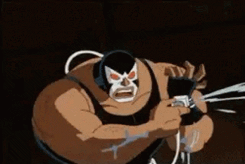Bane From The Batman Animated Series Is Holding A Gun In His Hand . GIF