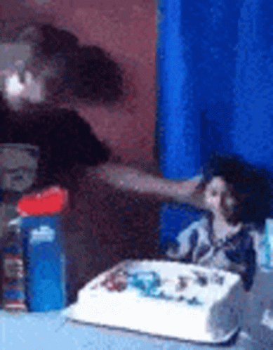 Banging Head On The Cake On Desk GIF