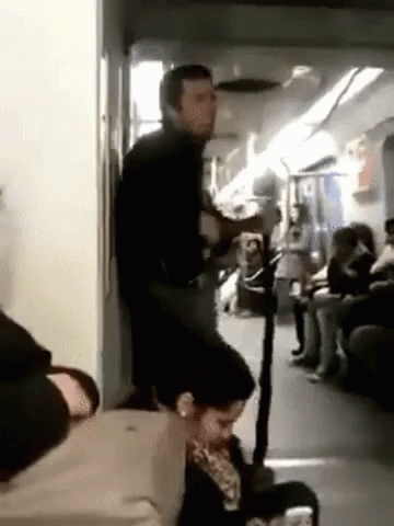 Hilarious Man Banging Head On Wall Train GIF