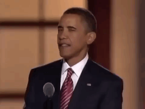 Barack Obama Is Giving A Speech In Front Of A Microphone And Making A Funny Face . GIF