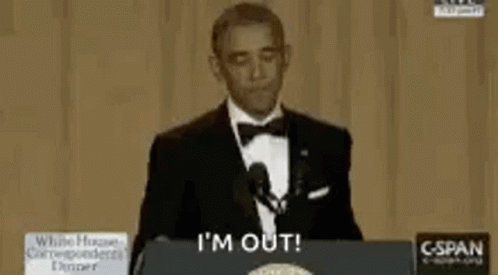 Barack Obama Is Giving A Speech In Front Of A Microphone And Says I 'M Out . GIF
