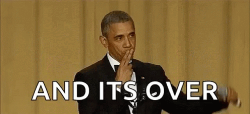 Barack Obama Is Holding A Microphone In His Hand And Covering His Mouth With His Hand . GIF