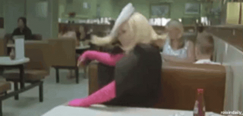 Barbie Doll Sitting Legs Crossed in Diner