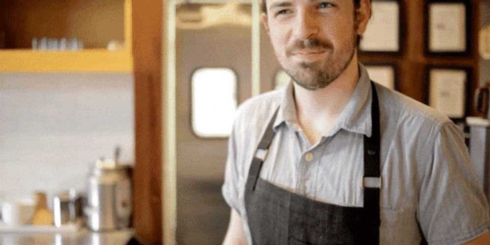 Barista Trying Not To Laugh GIF