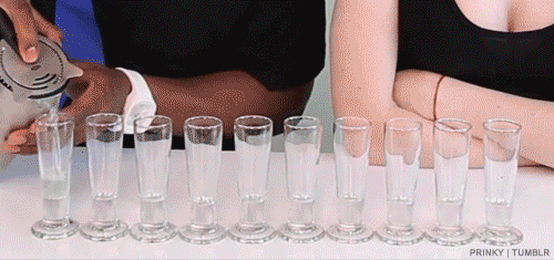 Bartender Pouring Colorful Drinks GIF