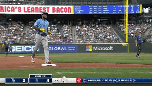 Baseball Game at Rica's Leanest Bacon Sign