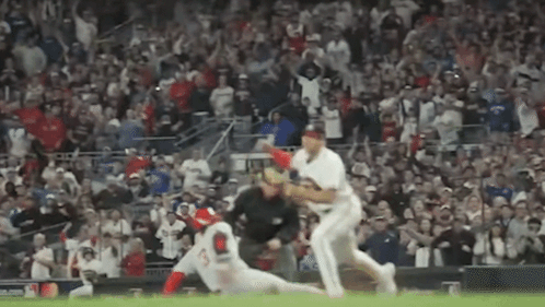 Baseball Game in Crowded Stadium