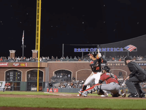 Baseball Game in Front of Bank of America Sign
