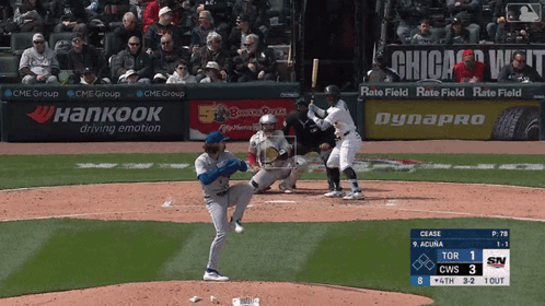 Baseball Game in Front of Hankook Advertisement