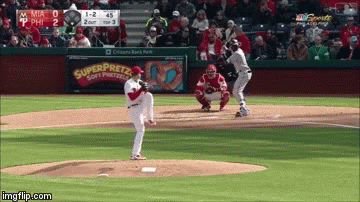 Baseball Game in Front of Pretzel Ad
