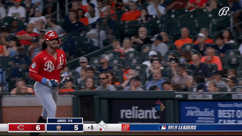 Baseball Game in Front of Reliant Banner