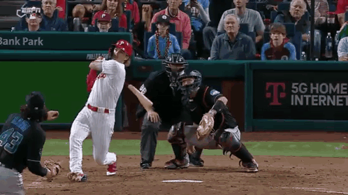 Baseball Game In Front Of T-Mobile Ad GIF