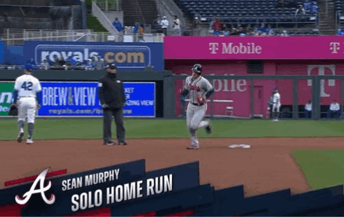 Baseball Game In Front Of T-Mobile Banner GIF